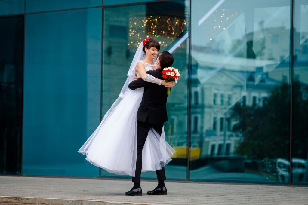 A joyful couple celebrating their wedding day with a stunning Las Vegas backdrop. — questions for Las Vegas wedding planner