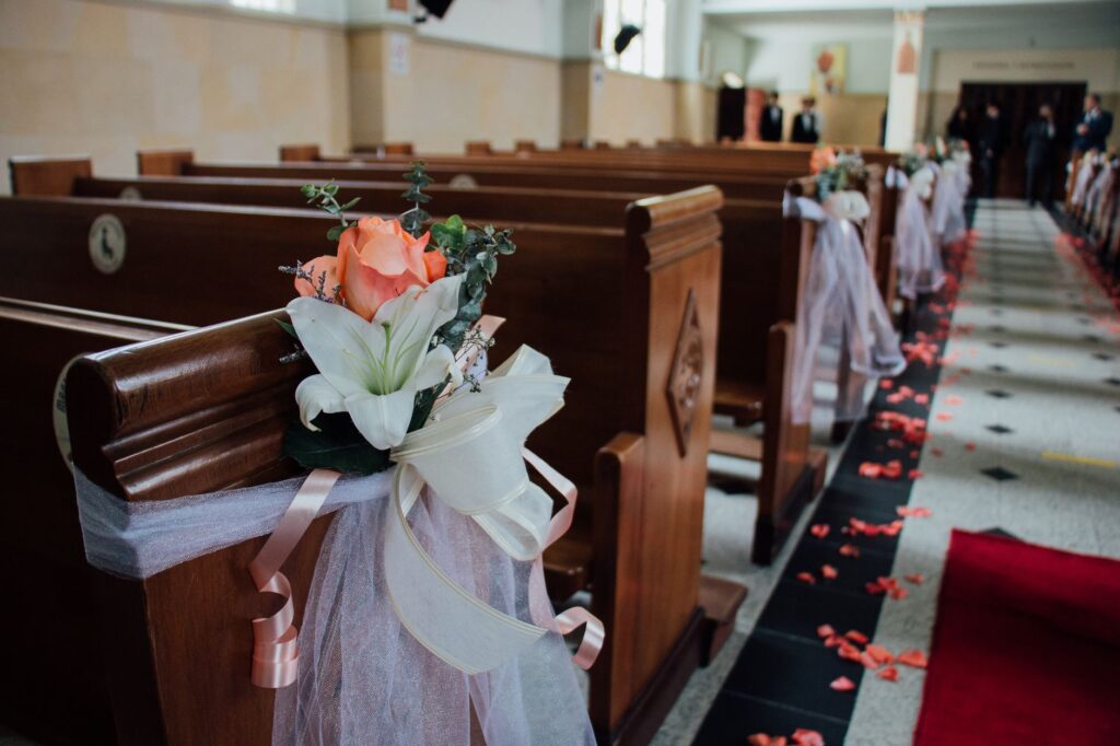 A romantic ceremony at The Little Church of the West with floral decorations. — unique wedding venues Las Vegas