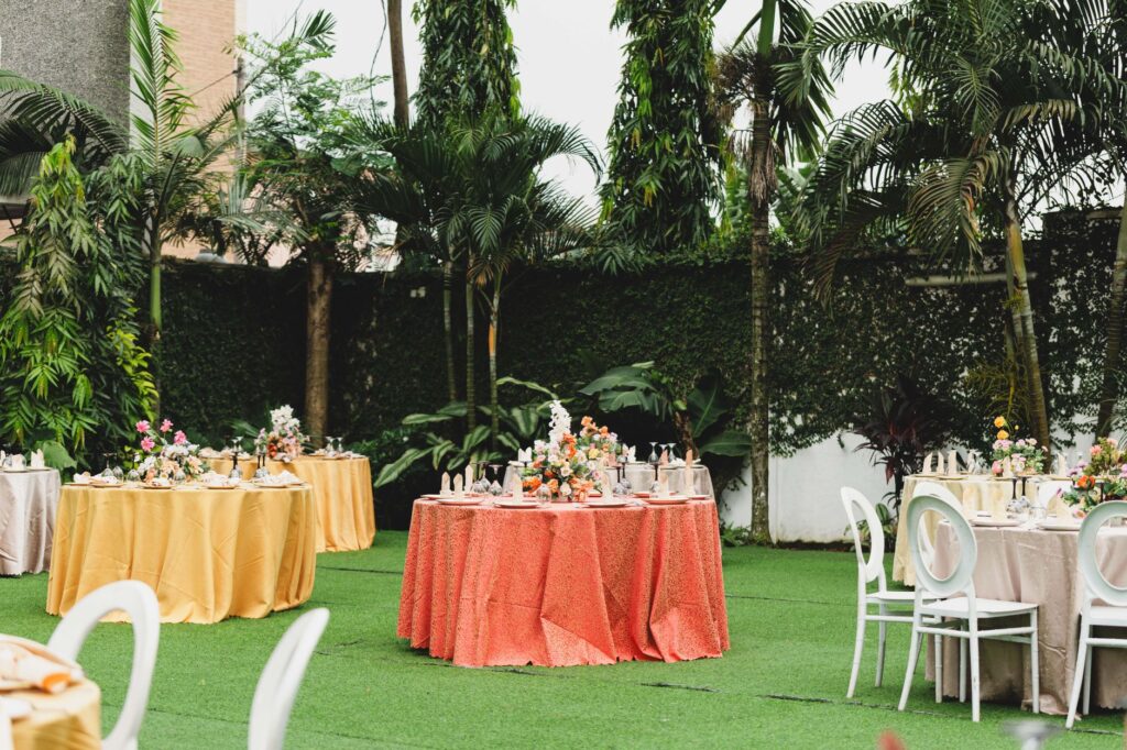 A vibrant garden wedding scene with lush greenery and floral arrangements. — Las Vegas wedding themes 2026
