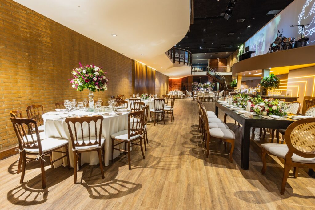 An elegant wedding reception setup featuring floral arrangements. — wedding packages Las Vegas