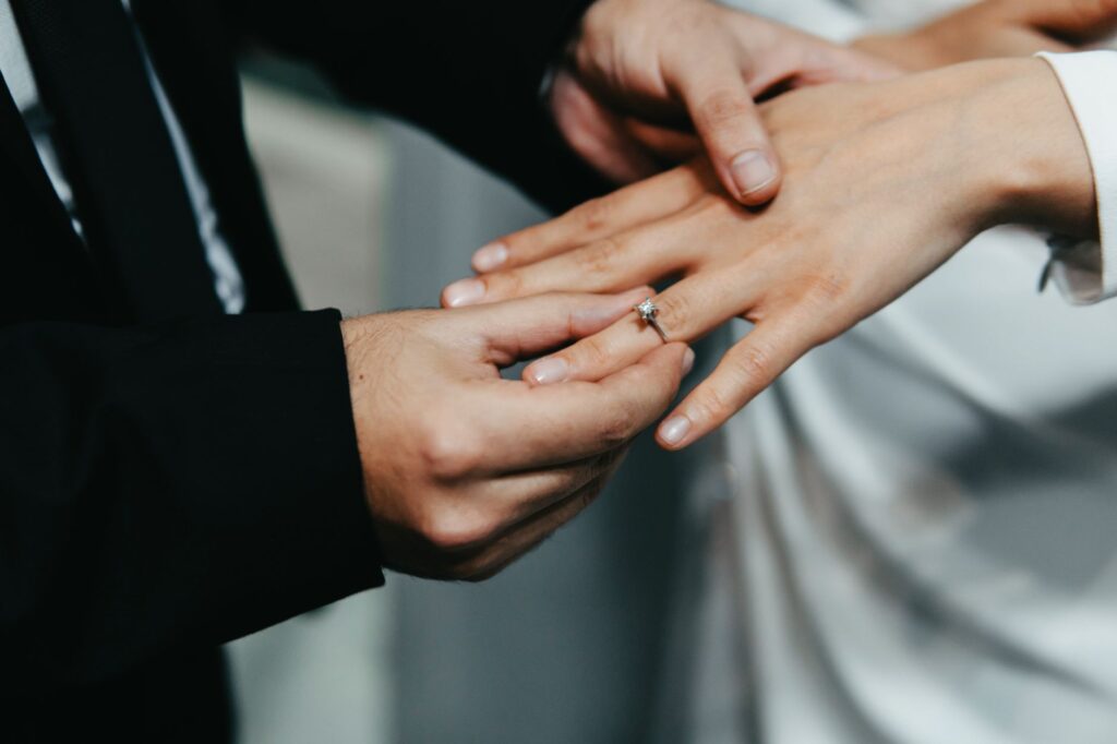 Couple exchanging vows on a rooftop with the Vegas skyline in the background. — Las Vegas destination wedding
