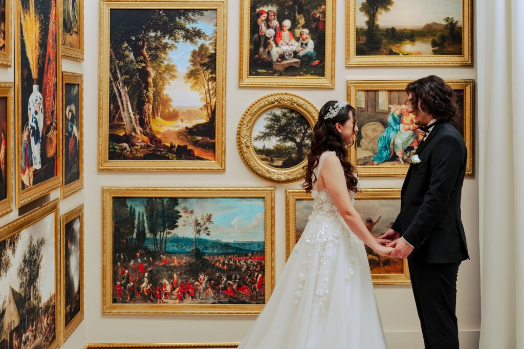 Couples celebrating at an art gallery wedding venue, showcasing creative decor. — Las Vegas wedding trends 2026
