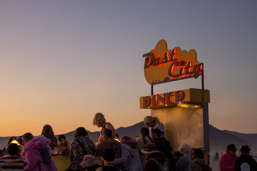 Creative wedding photography showcasing the Neon Boneyard's unique signs. — Las Vegas wedding photographers